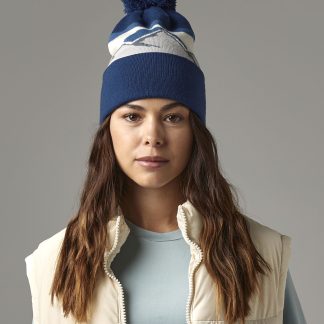 Mountain peaks pom pom beanie in Alpine Peaks - North Print Workwear