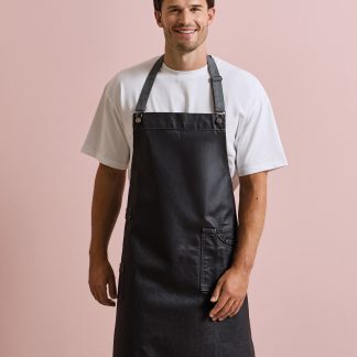 District waxed-look denim bib apron in Black Denim - North Print Workwear